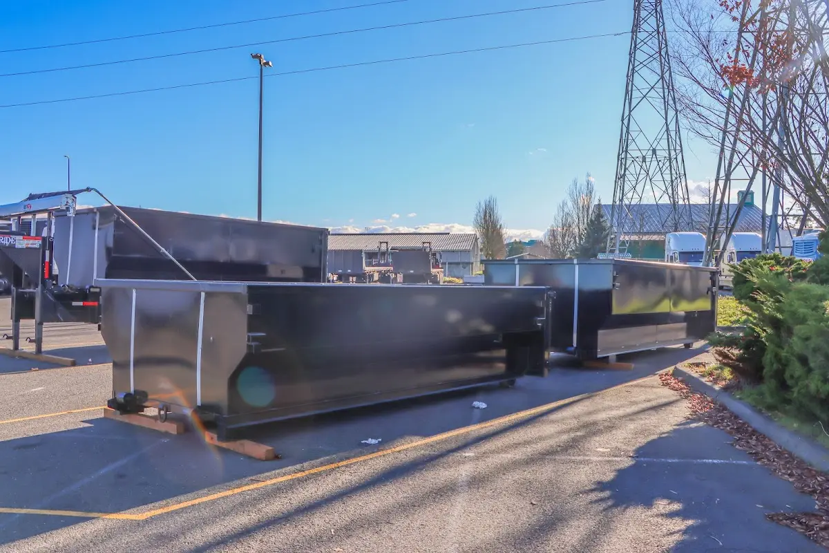 Roll-off dumpster ready for waste disposal at job site for Concrete Dumpster Rental in Flower Mound